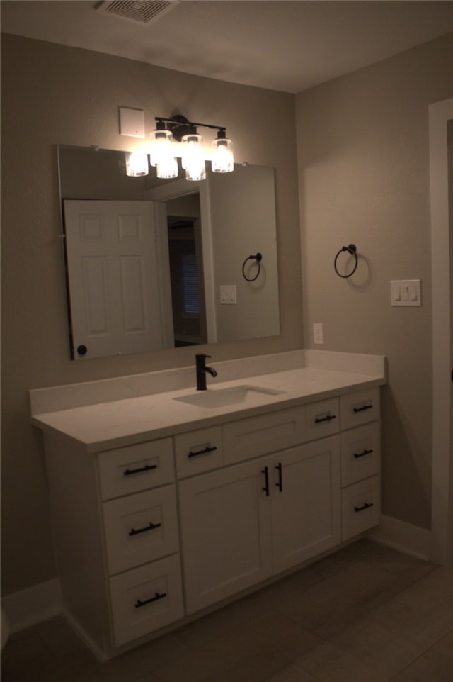 5105 Oak Ave, Pasadena, TX 77503 - bathroom featuring vanity and baseboards
