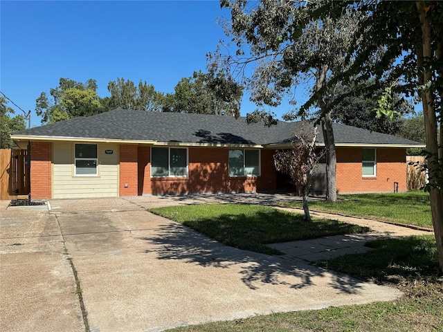 5105 Oak Ave, Pasadena, TX 77503 - ranch-style house featuring brick siding and concrete driveway