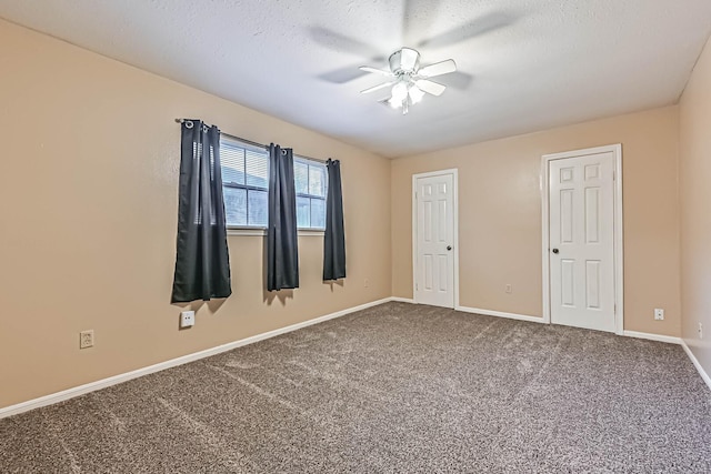 55 Sweetgum Ct, Lake Jackson, TX 77566 - unfurnished room with a ceiling fan, dark colored carpet, and a textured ceiling