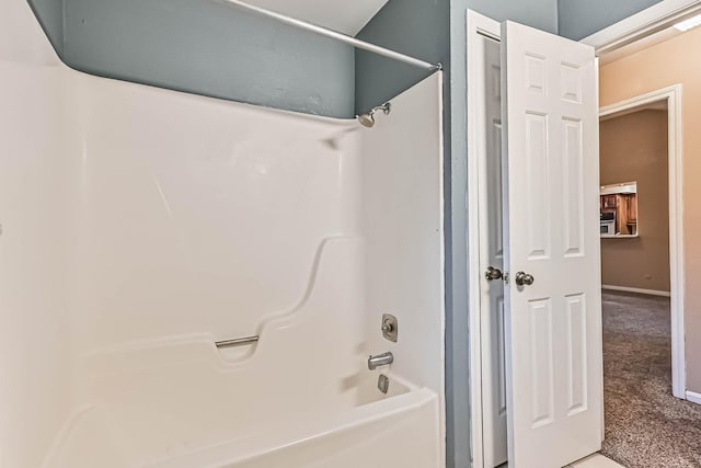 55 Sweetgum Ct, Lake Jackson, TX 77566 - bathroom with shower / bathtub combination and baseboards