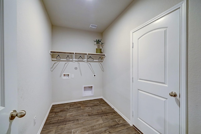 14242 W Pine Heart Dr, Conroe, TX 77302 - washroom with dark wood-style flooring, hookup for a washing machine, and hookup for an electric dryer