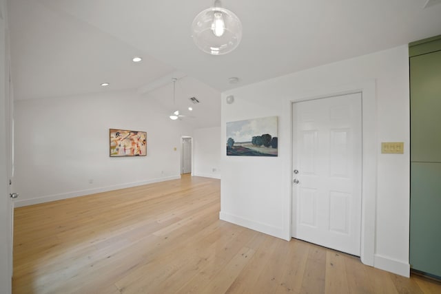 5730 Chrystell Ln, Houston, TX 77092 - unfurnished living room featuring light wood-style flooring, lofted ceiling, and recessed lighting