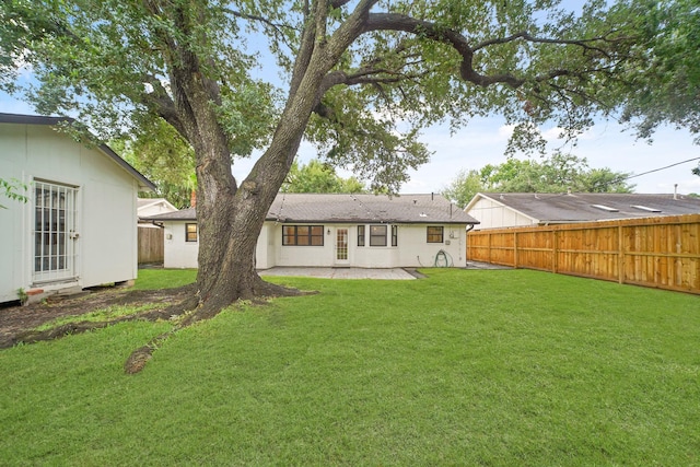 5730 Chrystell Ln, Houston, TX 77092 - back of house featuring a fenced backyard and a patio