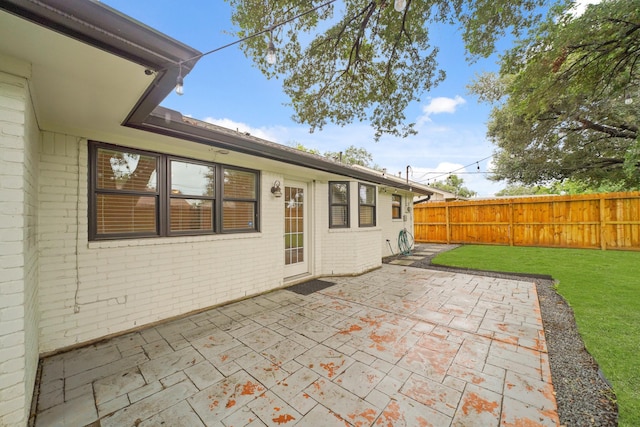 5730 Chrystell Ln, Houston, TX 77092 - fenced backyard with a patio area
