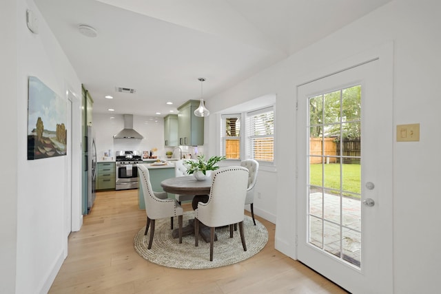 5730 Chrystell Ln, Houston, TX 77092 - dining area featuring light wood finished floors and recessed lighting