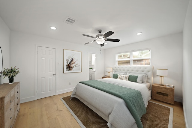 5730 Chrystell Ln, Houston, TX 77092 - bedroom with light wood-style floors, recessed lighting, ceiling fan, and ensuite bathroom