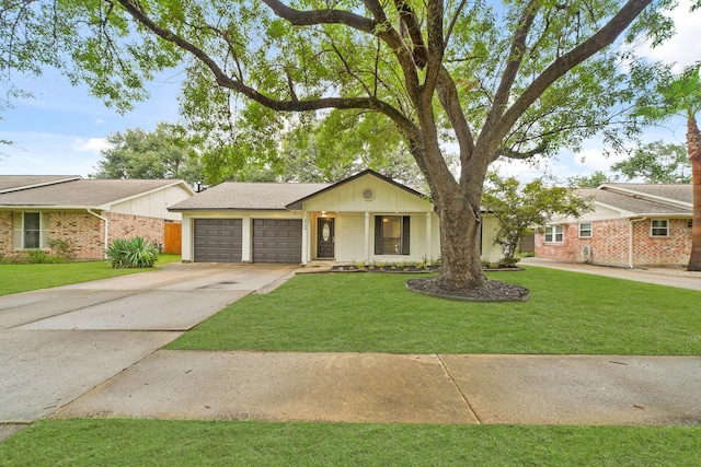 5730 Chrystell Ln, Houston, TX 77092 - single story home with brick siding, concrete driveway, a garage, and a front lawn