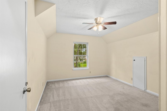 3315 Crestdale Dr, Houston, TX 77080 - bonus room with a ceiling fan, vaulted ceiling, carpet, and a textured ceiling