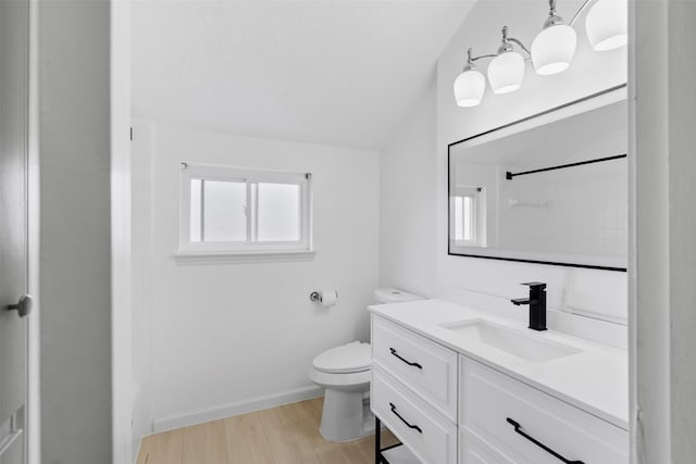 3315 Crestdale Dr, Houston, TX 77080 - bathroom with vanity, wood finished floors, vaulted ceiling, and a shower