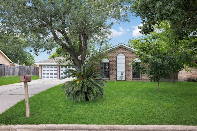 375 Sulky Trail St, Houston, TX 77060 - view of front facade with brick siding, driveway, and a garage