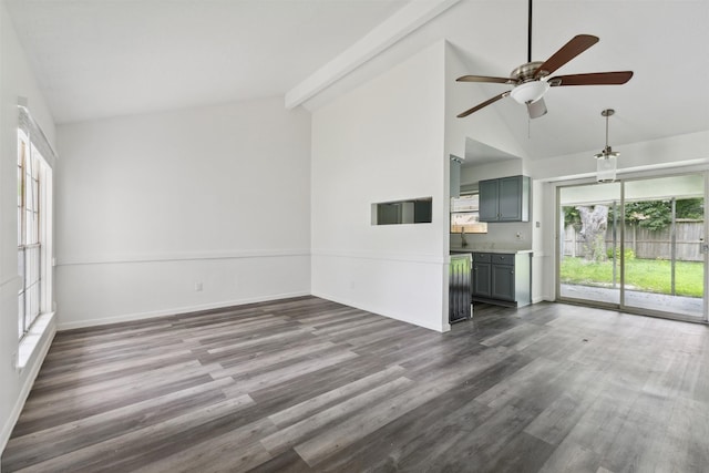 375 Sulky Trail St, Houston, TX 77060 - unfurnished living room with high vaulted ceiling, ceiling fan, dark wood-style flooring, and healthy amount of natural light