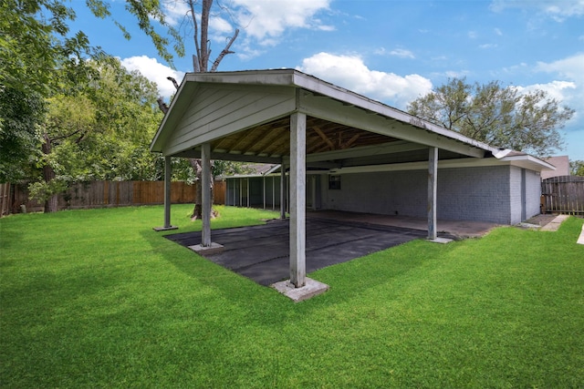 375 Sulky Trail St, Houston, TX 77060 - view of parking / parking lot featuring a fenced backyard and a carport