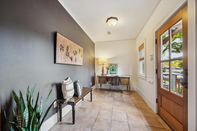 711 Pizer St, Houston, TX 77009 - foyer with healthy amount of natural light and light tile patterned floors
