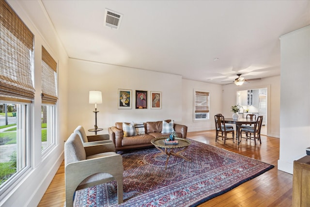 711 Pizer St, Houston, TX 77009 - living area with wood finished floors and ceiling fan