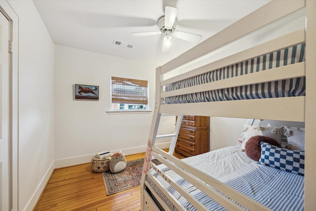 711 Pizer St, Houston, TX 77009 - bedroom featuring wood finished floors and ceiling fan