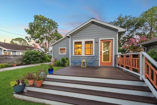 711 Pizer St, Houston, TX 77009 - back of house at dusk with a deck