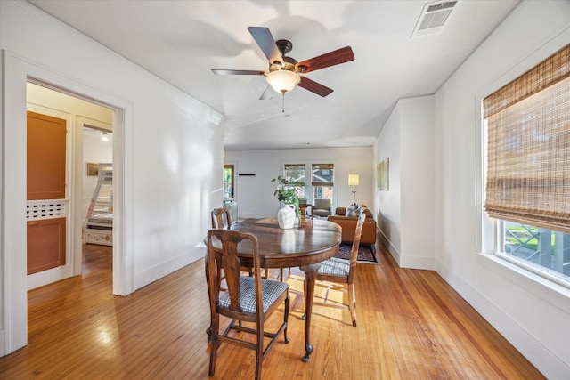 711 Pizer St, Houston, TX 77009 - dining space featuring light wood-type flooring and ceiling fan