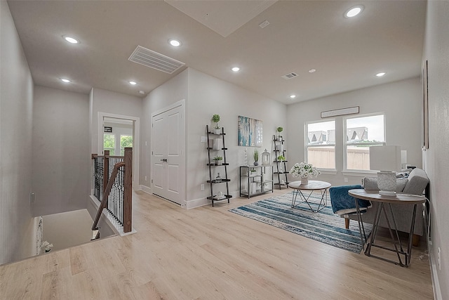 3837 Mainer St, Houston, TX 77021 - sitting room featuring an upstairs landing, wood finished floors, and recessed lighting