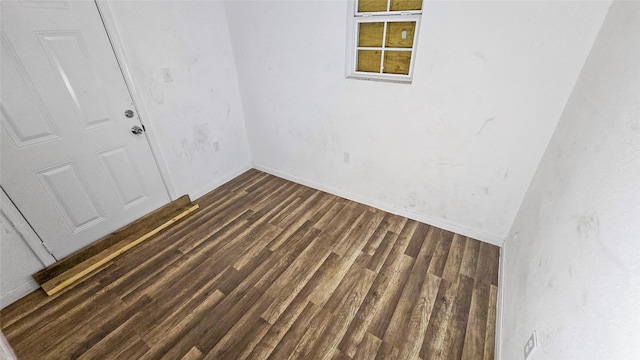 2235 Hutton St, Houston, TX 77026 - spare room with dark wood finished floors and baseboards