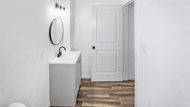 2235 Hutton St, Houston, TX 77026 - bathroom with wood finished floors and vanity