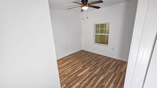 2235 Hutton St, Houston, TX 77026 - empty room featuring dark wood-style flooring and ceiling fan