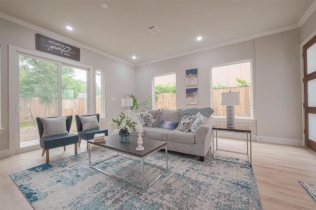 3835 Mainer St, Houston, TX 77021 - living room with ornamental molding, light wood-style flooring, and recessed lighting