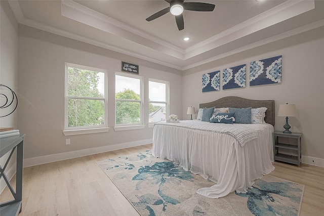 3835 Mainer St, Houston, TX 77021 - bedroom featuring crown molding, a tray ceiling, wood finished floors, recessed lighting, and ceiling fan