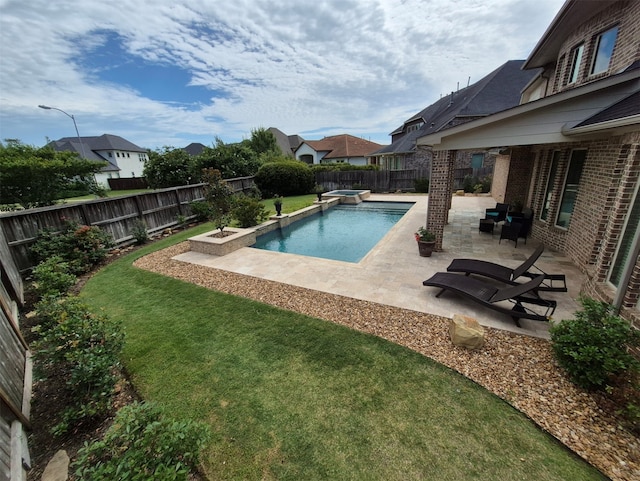 7106 Prairie Grass Ln, Katy, TX 77493 - view of pool featuring a fenced backyard, a patio, and a pool with connected hot tub