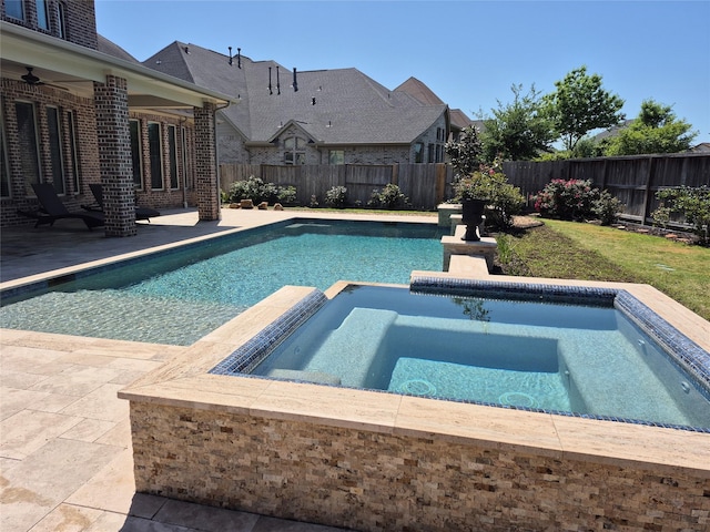 7106 Prairie Grass Ln, Katy, TX 77493 - view of swimming pool featuring a fenced backyard, a patio, a pool with connected hot tub, and a ceiling fan