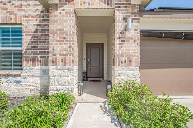 903 Curly Angora Ct, Rosharon, TX 77583 - property entrance featuring brick siding and stone siding