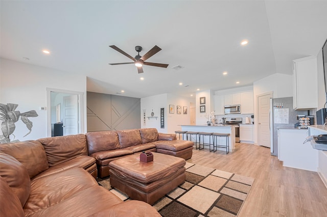 903 Curly Angora Ct, Rosharon, TX 77583 - living room with light wood-style floors, a ceiling fan, and recessed lighting
