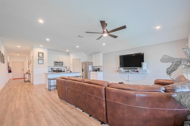 903 Curly Angora Ct, Rosharon, TX 77583 - living room featuring ceiling fan, light wood-style floors, and recessed lighting