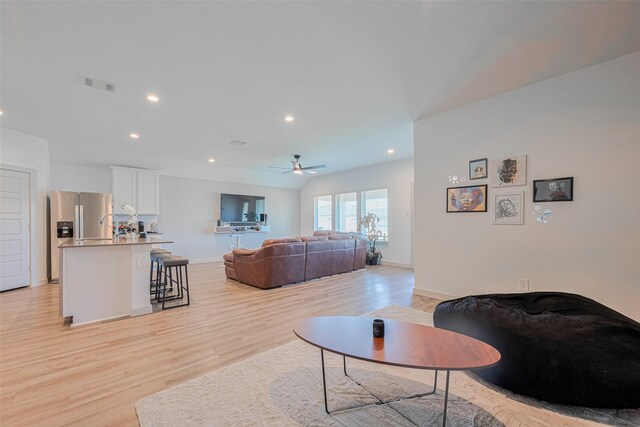 903 Curly Angora Ct, Rosharon, TX 77583 - living room with light wood-style floors, ceiling fan, and recessed lighting