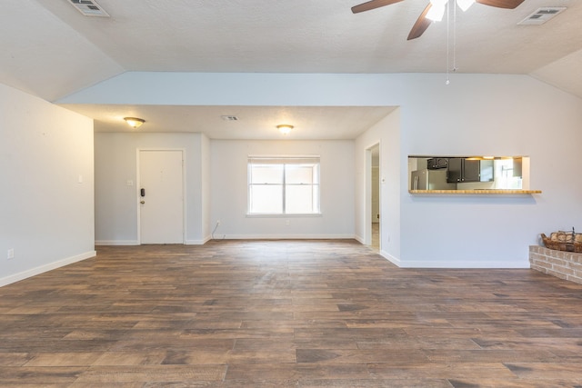 9938 Rustic Rock Rd, La Porte, TX 77571 - unfurnished living room with lofted ceiling, a ceiling fan, and wood finished floors