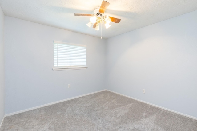 9938 Rustic Rock Rd, La Porte, TX 77571 - carpeted spare room with baseboards and ceiling fan