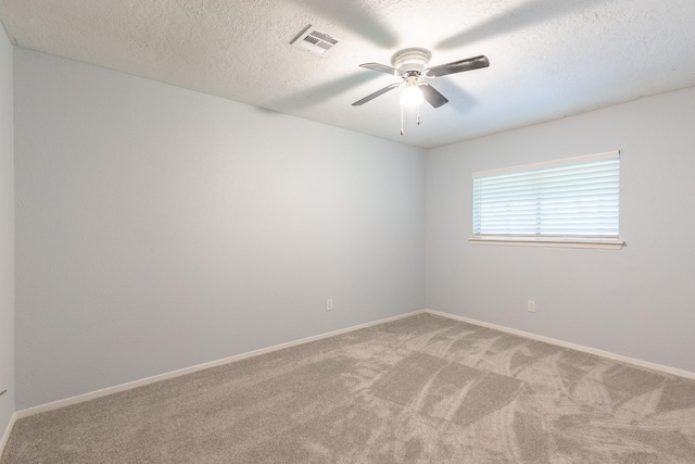 9938 Rustic Rock Rd, La Porte, TX 77571 - carpeted empty room with ceiling fan and a textured ceiling