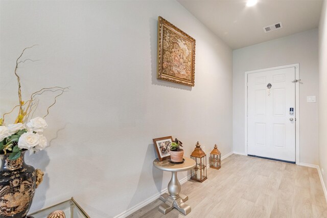 1614 Chase Anchor Ct, Richmond, TX 77469 - foyer entrance with light wood-type flooring