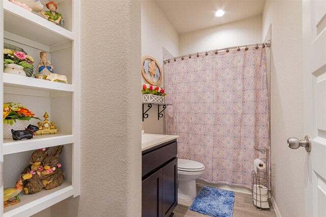 1614 Chase Anchor Ct, Richmond, TX 77469 - full bath featuring vanity, wood finished floors, and a shower with curtain