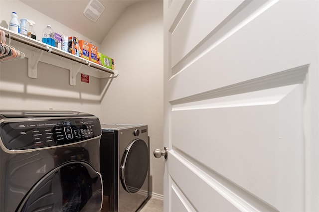 1614 Chase Anchor Ct, Richmond, TX 77469 - laundry room featuring washing machine and dryer and baseboards