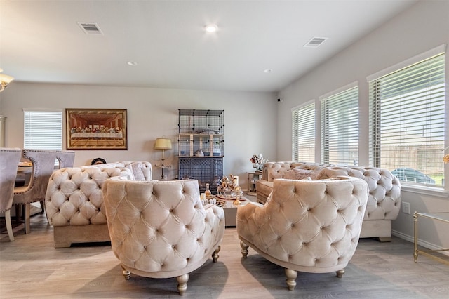 1614 Chase Anchor Ct, Richmond, TX 77469 - living room featuring light wood-type flooring and recessed lighting