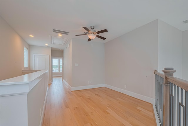 8324 Ginger Oak St, Houston, TX 77055 - spare room with attic access, ceiling fan, light wood-style floors, and recessed lighting