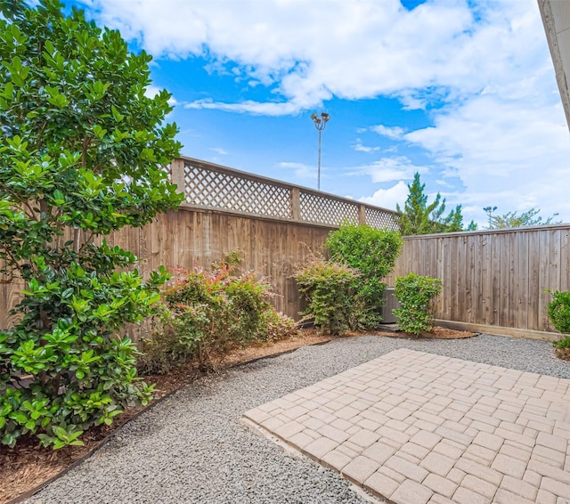 8324 Ginger Oak St, Houston, TX 77055 - fenced backyard with a patio area