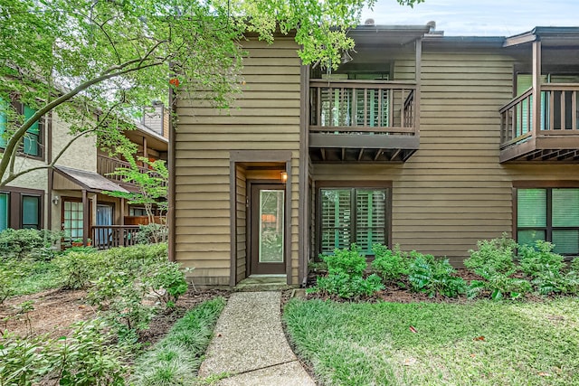 11711 Memorial Dr Unit 213, Houston, TX 77024 - doorway to property with a balcony