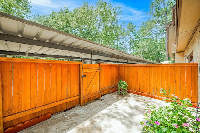 11711 Memorial Dr Unit 213, Houston, TX 77024 - view of patio with a gate