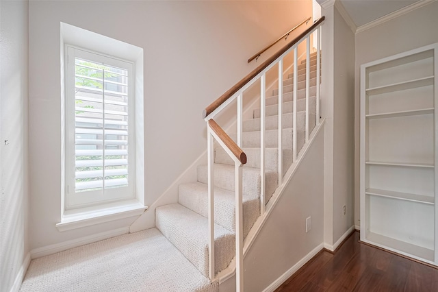11711 Memorial Dr Unit 213, Houston, TX 77024 - stairs with ornamental molding and wood finished floors