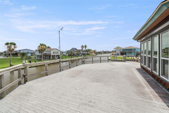 174 Sand Shoals Rd, Freeport, TX 77541 - wooden terrace featuring a residential view and a water view