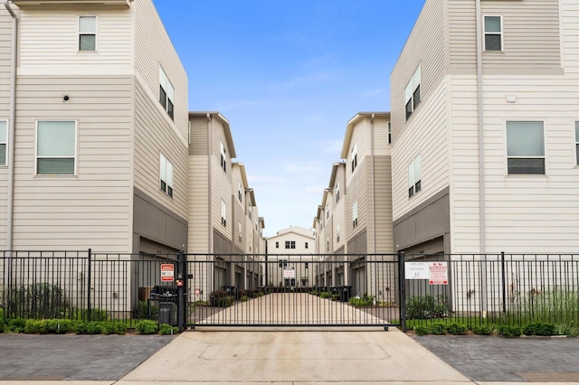 2753 Clinton Dr, Houston, TX 77020 - view of concrete road with a gate