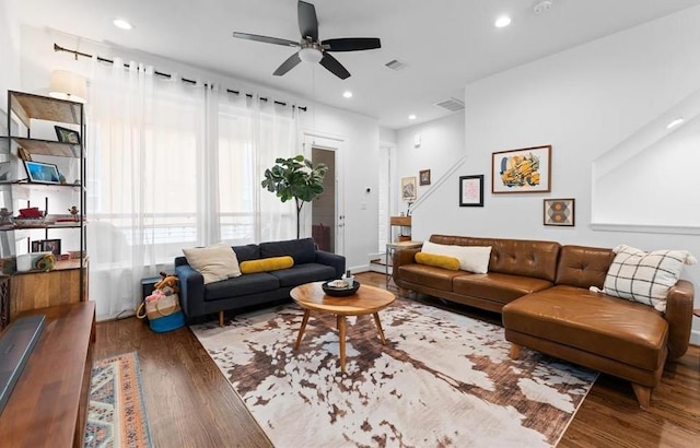 2753 Clinton Dr, Houston, TX 77020 - living area featuring wood finished floors, ceiling fan, and recessed lighting