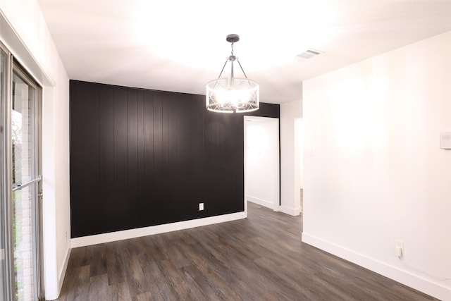 7706 Garsee Dr, Houston, TX 77040 - unfurnished room featuring a chandelier, dark wood-style flooring, and healthy amount of natural light