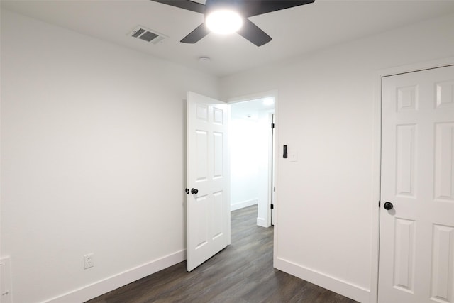 7706 Garsee Dr, Houston, TX 77040 - unfurnished bedroom with dark wood finished floors and ceiling fan